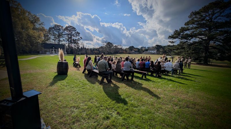 Outdoor ceremony with open field